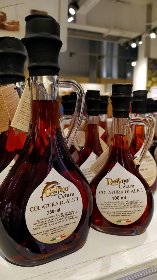 A traditional bottle of Anchovy Sauce (Colatura di Alici) by Delfino, Cetara, Amalfi Coast.