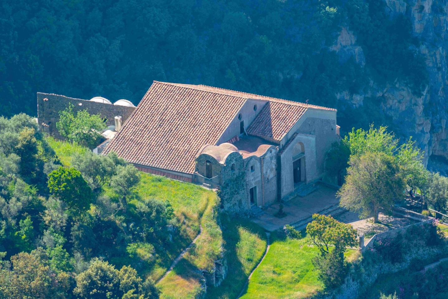 Exterior view of the San Domenico Convent in Praiano, nestled in the Amalfi Coast mountains