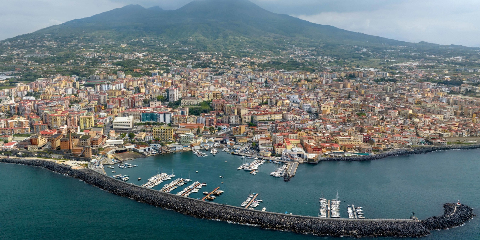 Aerial view of Torre del Greco on the Gulf of Naples with Mount Vesuvius behind