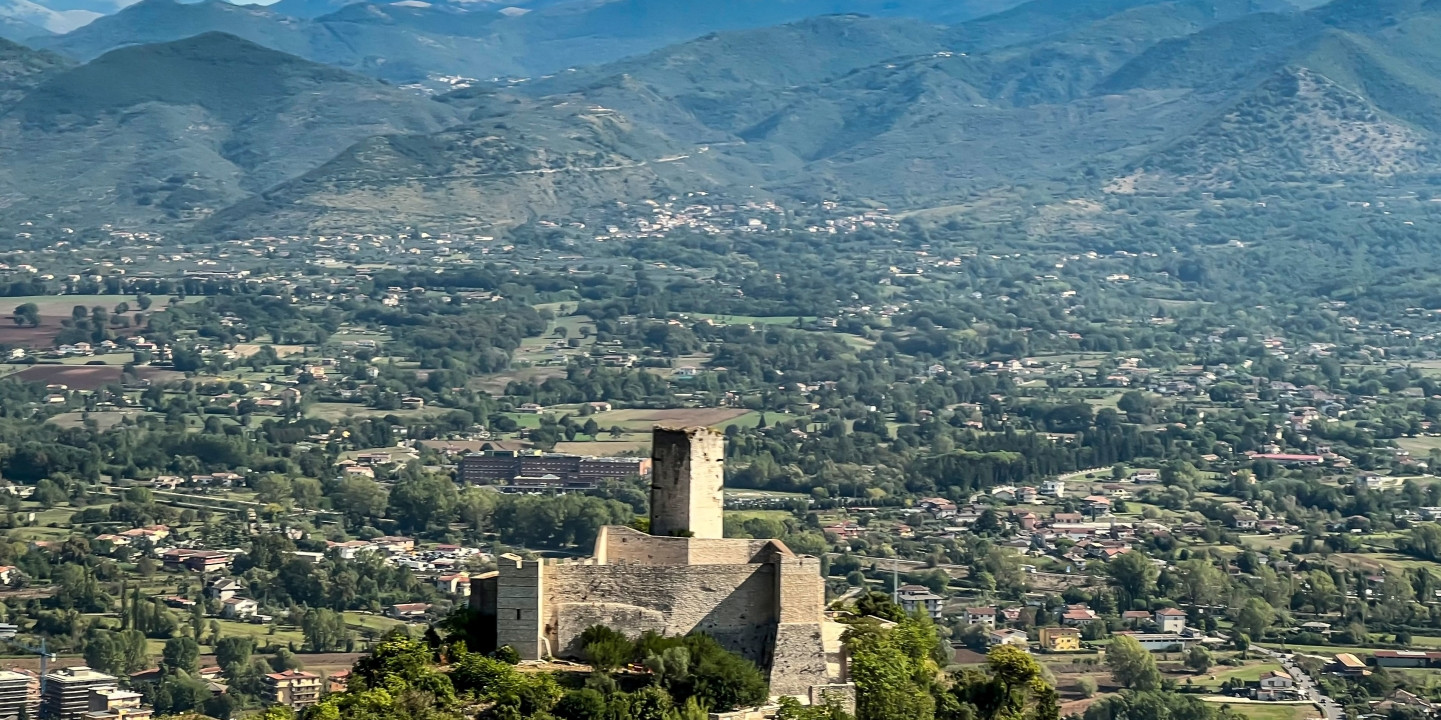 Montecassino Abbey perched on the hill, with the Liri Valley behind it