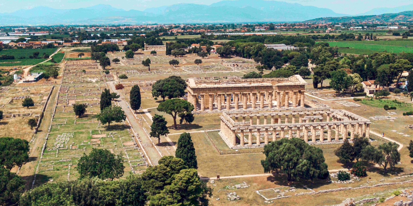 Panoramic view of the Greek temples in the Paestum Archaeological Park, a UNESCO site