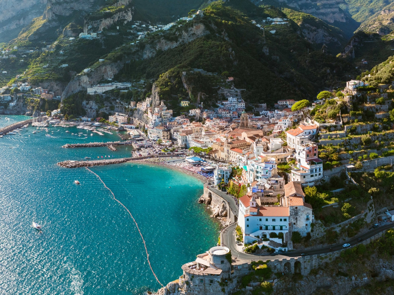Hiking group on a panoramic trail on the Amalfi Coast overlooking the sea and cliffs, Path of the Gods