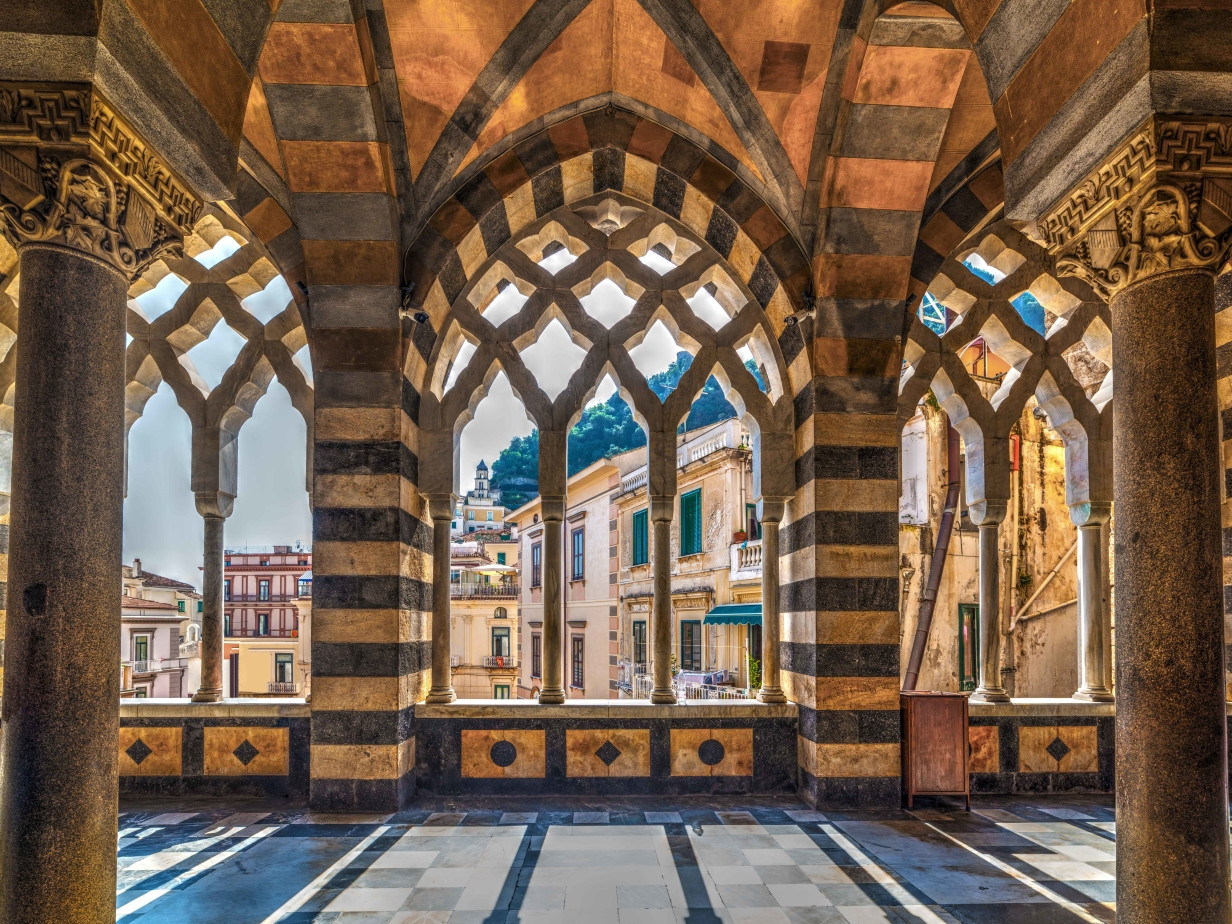 Cloister of Paradise inside Amalfi Cathedral with Arab-Norman arches and historic architecture