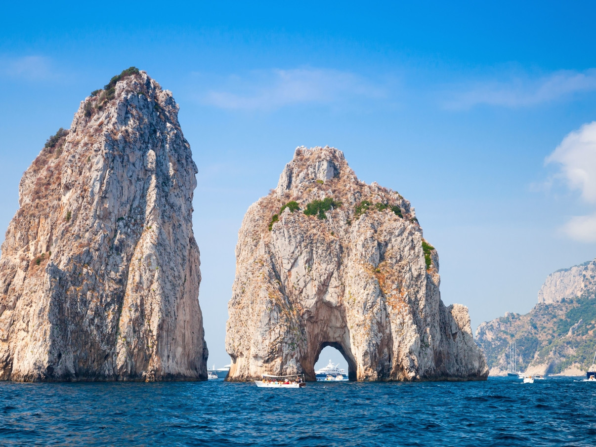 The Faraglioni of Capri, three rock stacks rising from the turquoise sea