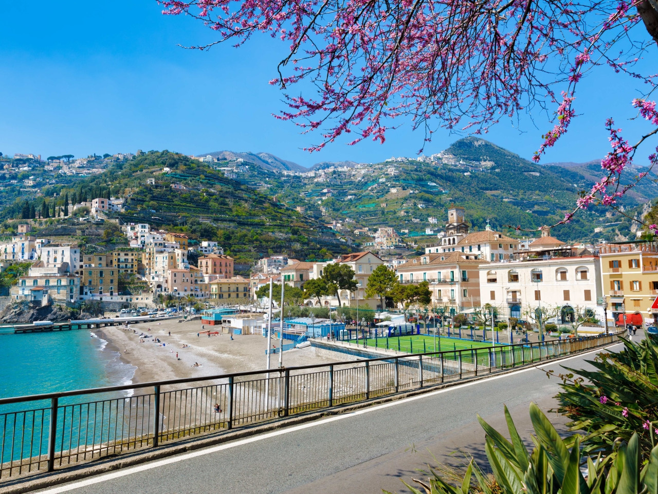 Minori beach and seafront with mountain panorama on the Amalfi Coast