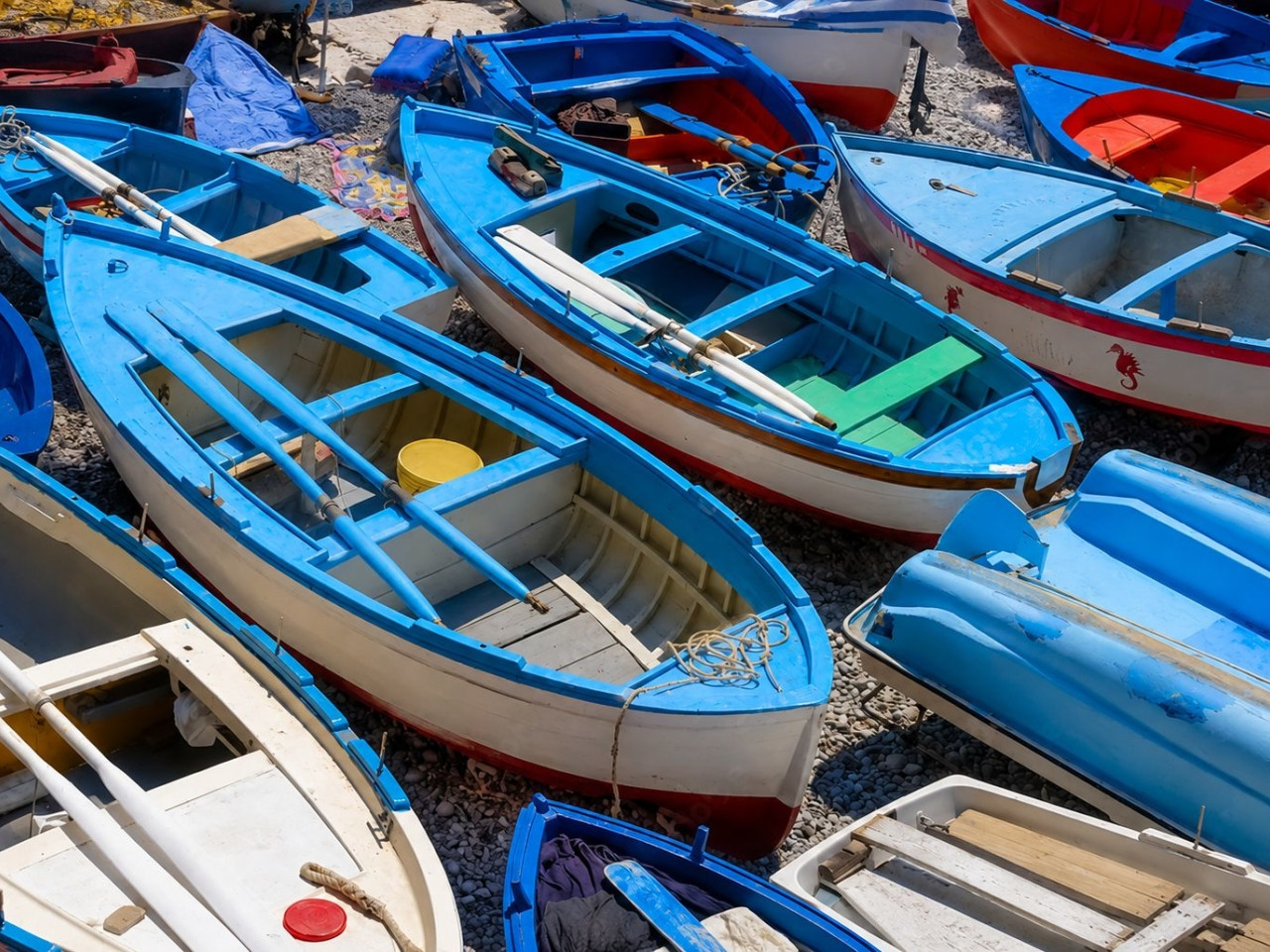 Traditional colourful fishing boats on the beach at Praiano