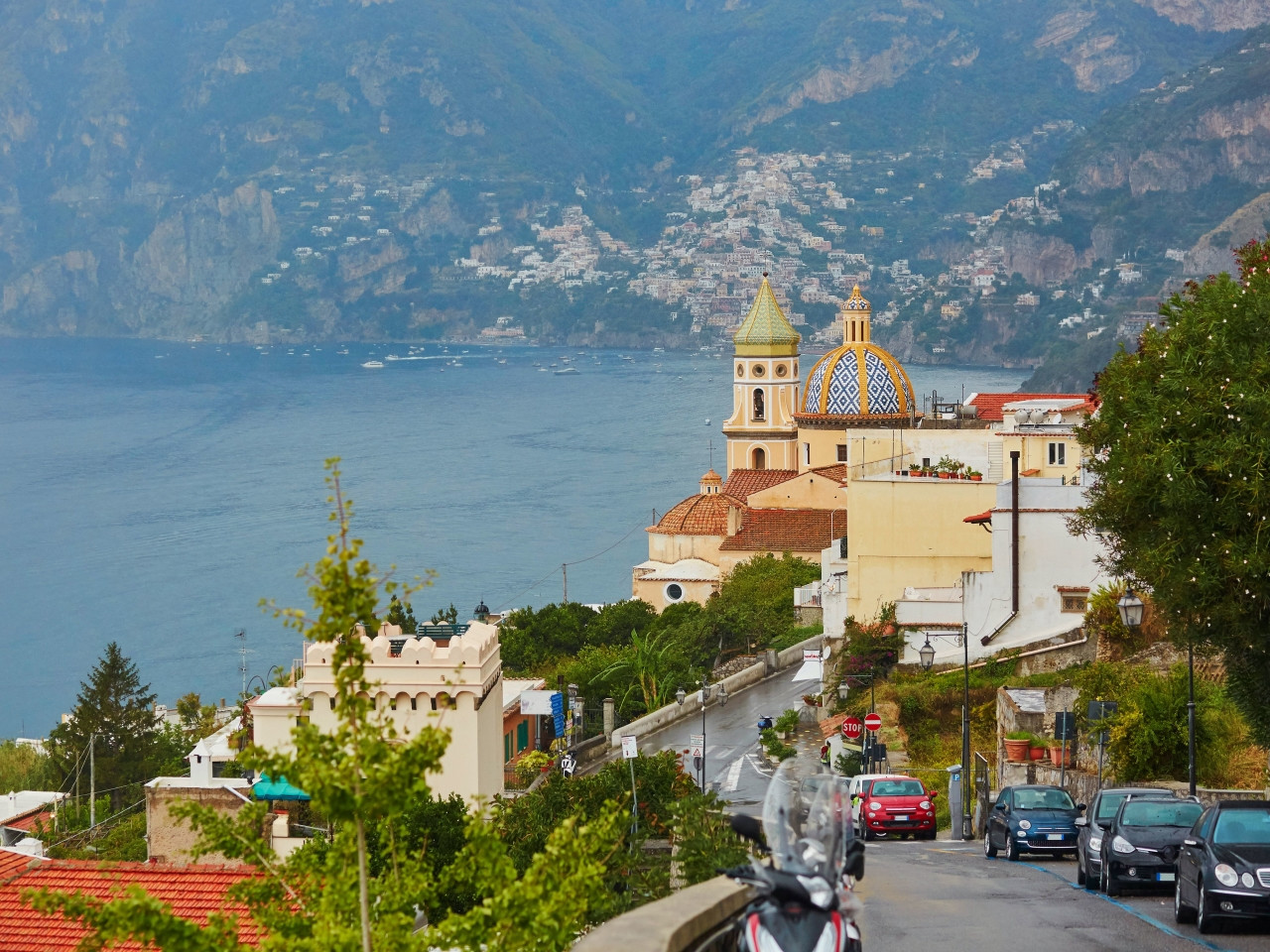 The majolica dome of San Gennaro above the sea at Praiano