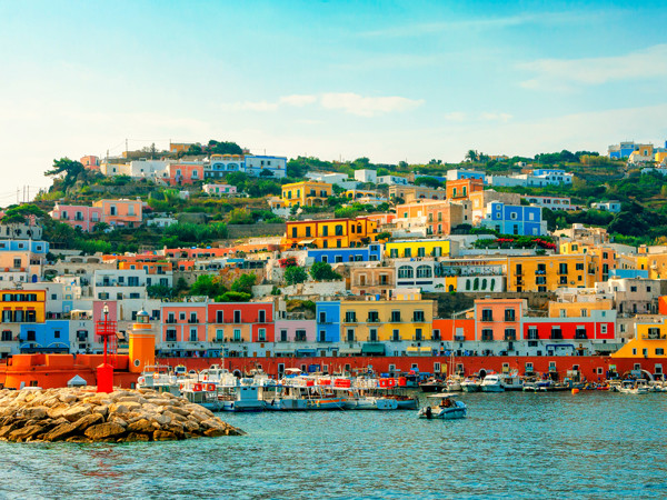 The port of Ponza and its pastel-coloured houses seen from above